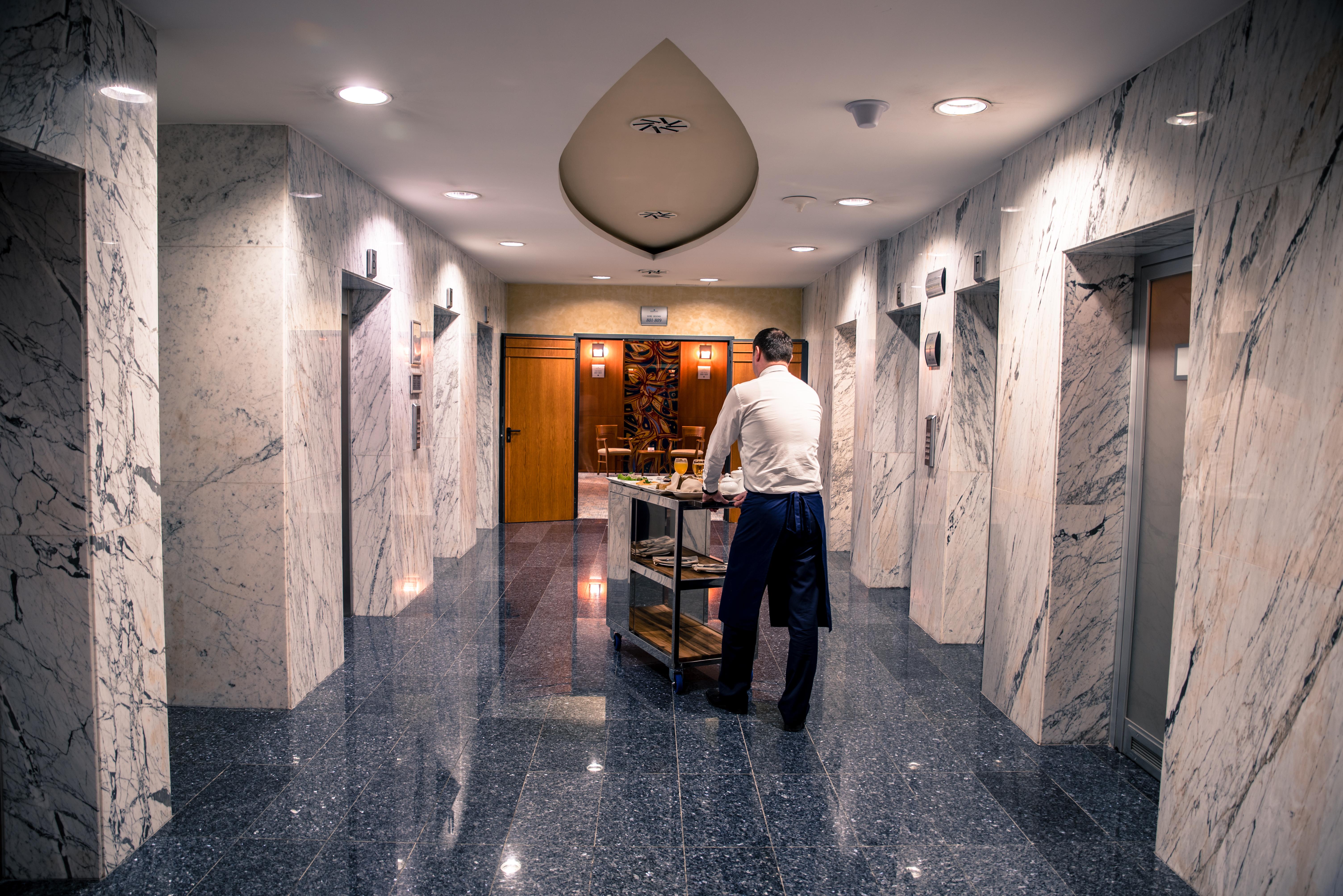 Hotel Radon Plaza SJJ Exterior foto A bellboy at the Four Seasons Hotel in Washington, D.C.